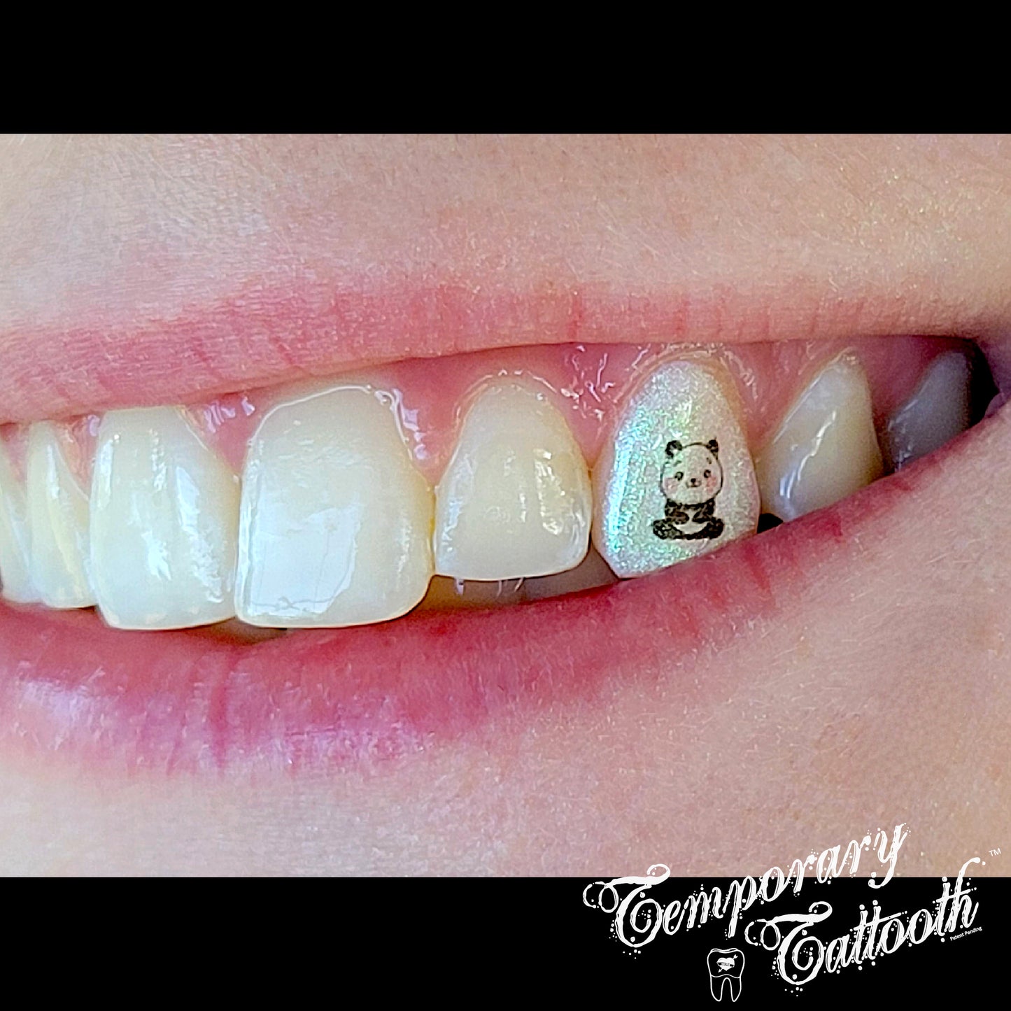 A Pink Lime Galaxy - Iridescent Colorant with no undercoat and a Panda Tooth Tattoo by Temporary Tattooth.