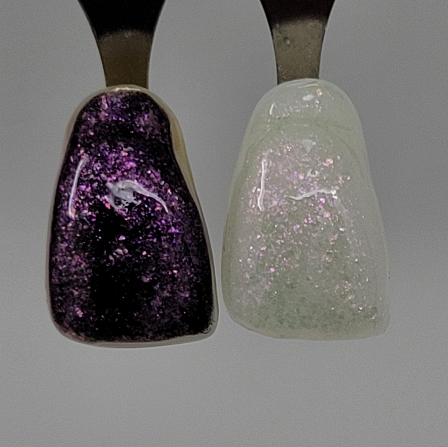 Red Opal Temporary Tattooth Colorant on a demo tooth.  These colorants can be applied to teeth to temporarily alter their color or iridescence.